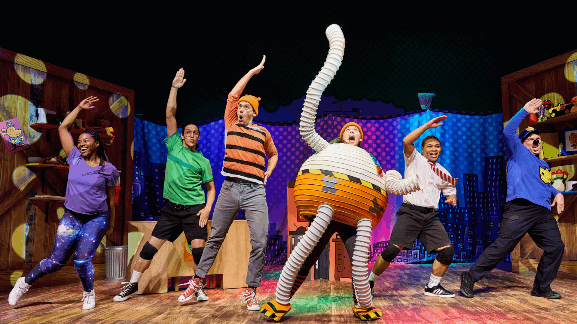 Characters from Dog Man: The Musical dancing